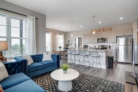 Luxury 2BR • 2 Balconies • Garage • Rooftop Pool